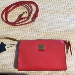 Dooney & Bourke Jamie crossbody bag in pink patent leather. New with tags.